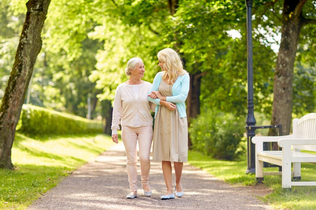 Mother and Daughter walking in the summer